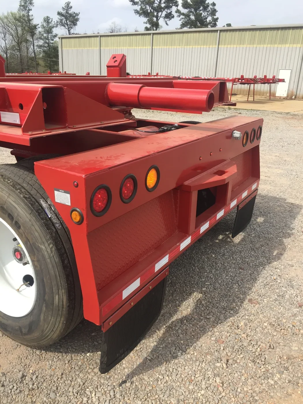 Pole trailer hauling pipe